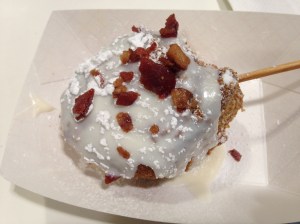 It's perfectly normal to eat bacon with (or in, or on) a cinnamon roll.